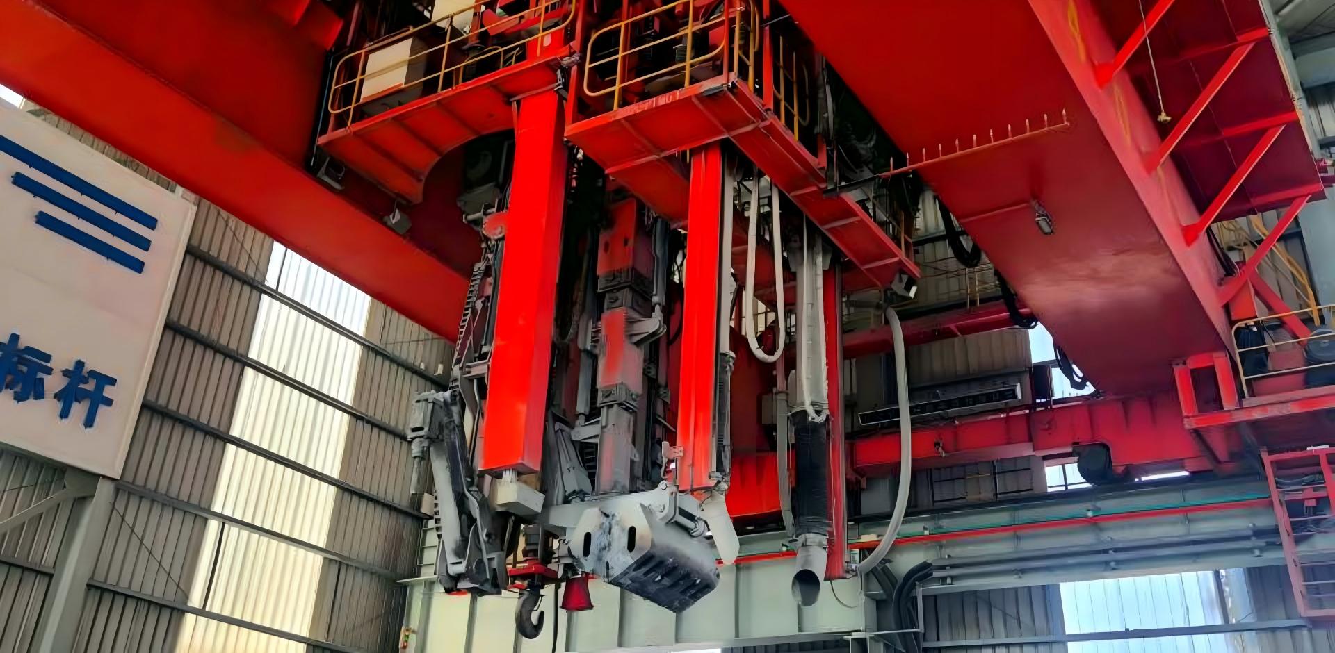 Specialized industrial overhead crane equipment for electrolytic aluminum production.